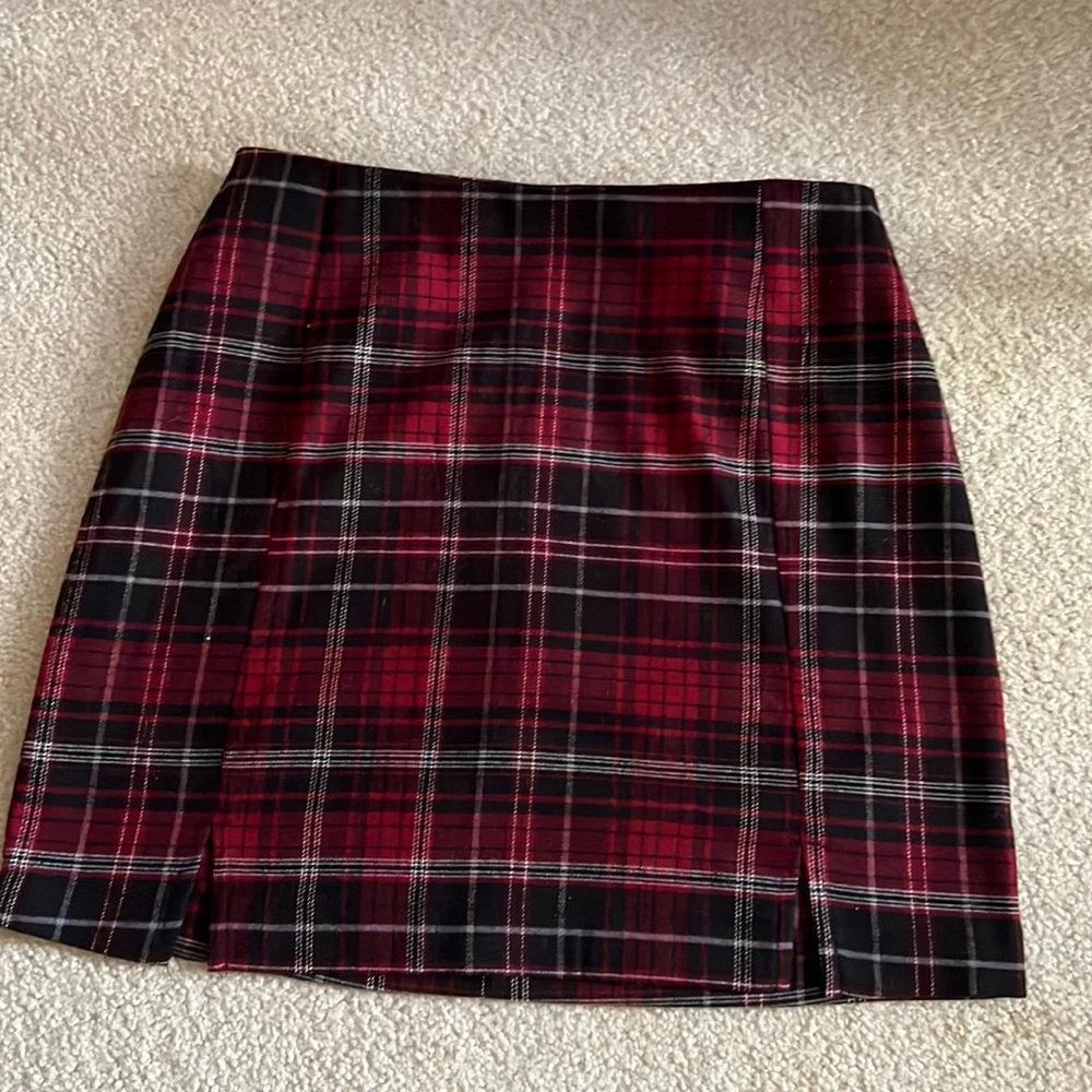 Eyeshadow red black and white plaid skirt with leg slits and back zipper.